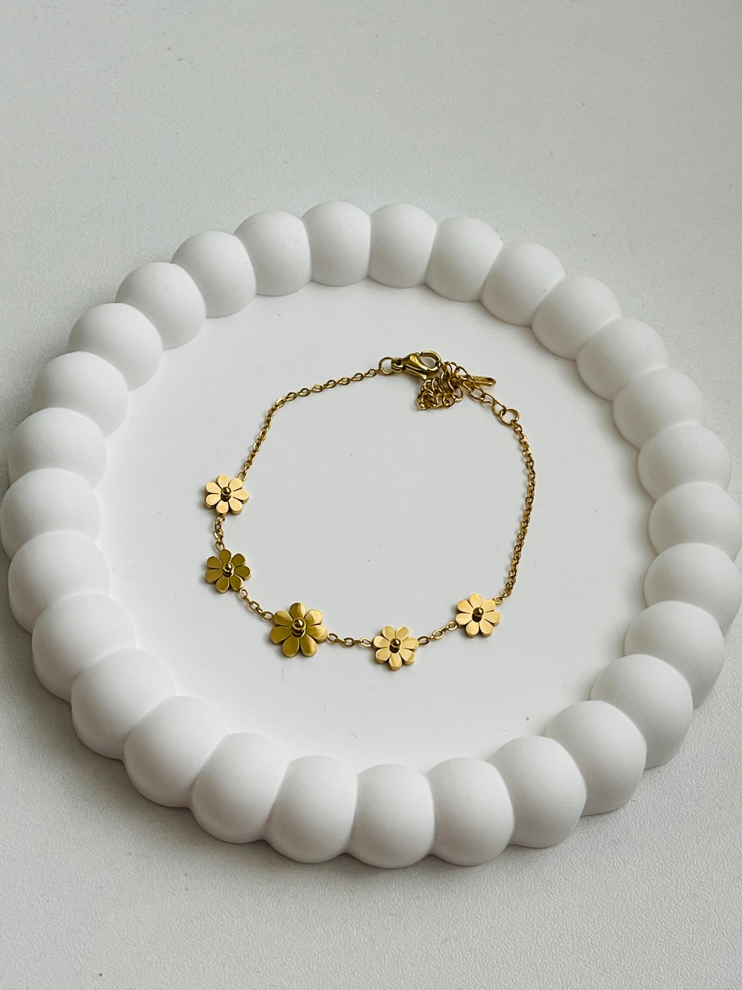 Florecitas doradas bracelets