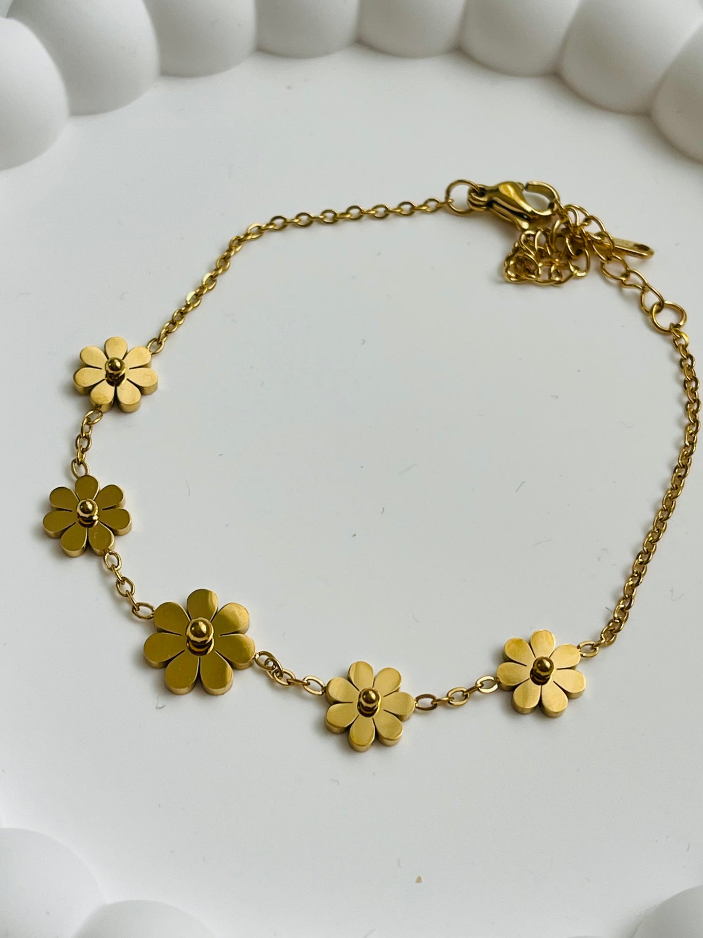 Florecitas doradas bracelets
