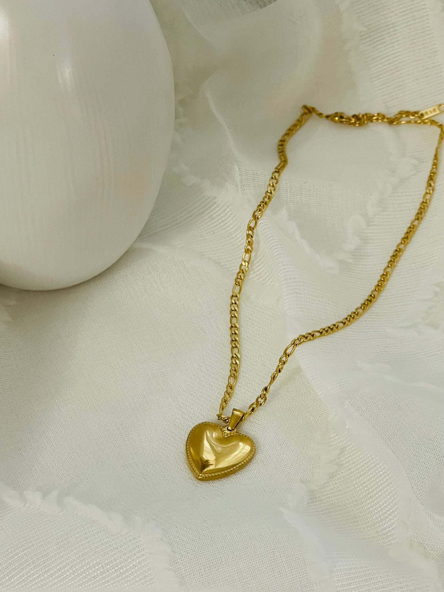 Gold heart in gold