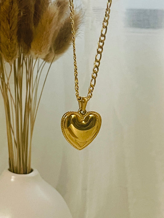Gold heart in gold